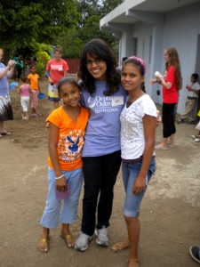 Monica Manglani ’13 with children in the Dominican Republic