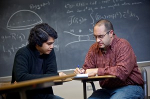 Farhan Abedin ’11 works with and Justin Corvino, associate professor of mathematics.
