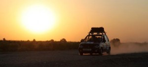 Sunset in the desert on the road to Mongolia; Nick Harvey '03