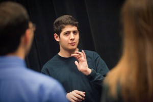 Daniel Ricken '12 directs fellow students during rehearsal.