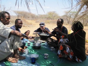 Beth Ponder '04 having lunch in a village in Kenya