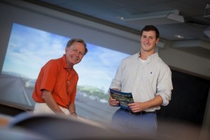 Gregory Allis ’12, right, did an independent study on sustainable stadium design, with David Veshosky, associate professor of civil and environmental engineering.