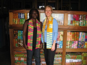 Ruth-Anne Renaud '86 (right) with Rose, who started a shop in Bonwire, Ghana, that makes and sells vestments and other items from Ghana's native kente cloth.