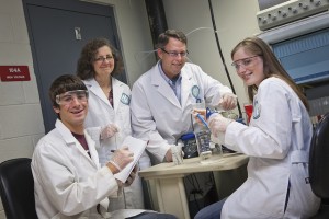 From left, Brian Peacock '12, Laurie Caslake, associate professor and head of biology, Arthur Kney, associate professor and head of civil and environmental engineering, and Annie Mikol '13 are using bacteria to improve the water quality of wetlands.