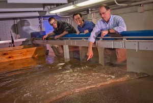 Aaron Birt ’12, left, and professors Daniel Sabatino and Lawrence Malinconico work in the newly refitted hydraulic flume lab.