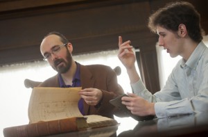 Christopher Phillips assistant professor of English and research assistant Gavin Jones '14 are using the library's digital scholarship resources to examine early circulation records at Easton Public Library.