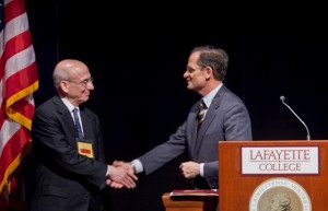 President Daniel H. Weiss, right, greets Eugene M. Tobin, program officer for The Andrew W. Mellon Foundation.