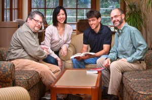 From left are Jeff Pfaffmann, associate professor and head of computer science; Joyce Laura Wong Hon Chan ’12; Nick Orzol ’13; and Chris Ruebeck, associate professor of economics.