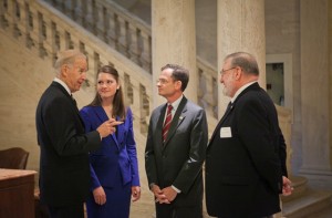 Vice President Joe Biden, l-r, speaks with Caroline Lang '13, Student Government president; President Daniel H. Weiss; and James Lennertz, associate professor of government and law, in Kirby Hall of Civil Rights.