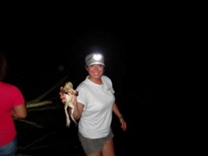 Paige Triola ’14 catches a cane toad in Nicaragua.