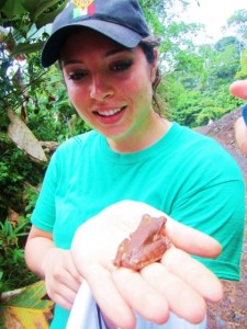 Paige Triola ’14 holds a tree frog.