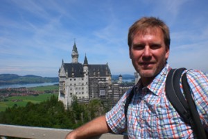 Keith Hanigan '85 stands in front of Neuschwanstein Castle, Bavaria, Germany, which he visited while stationed in Austria.