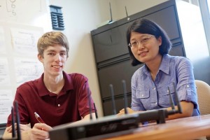 John Keller '14 and Xiaoyan Li, assistant professor of computer science, are working to perfect a Wi-Fi system that detects the positions of people and objects inside a building.