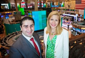 Nicholas Kalra '13 and Janna Hodge '94, senior vice president of sales and relationship management, in the members gallery overlooking the New York Stock Exchange. 