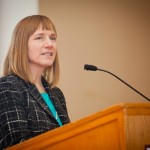 President-Elect Alison Byerly at a podium