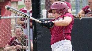 Softball player Jordan Parsons '13 takes a swing during a game.