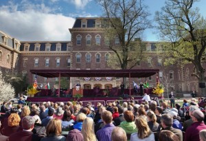President Jimmy Carter delivers a lecture on the Quad with Pardee Hall in the background. 