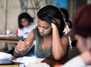 Jasmine Jay ’14 puts her thoughts down on paper.