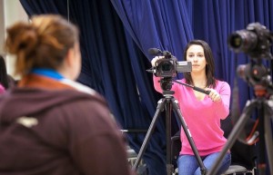 Stephanie Bateman ’13 films a session where a professional make-up artist demonstrates the effects of aging on students.