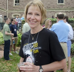 Beth Freebairn '88 poses in front of classmates during Reunion Weekend