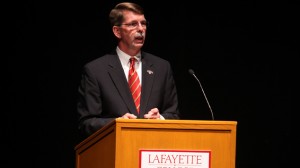 Bruce McCutcheon speaks at a podium.