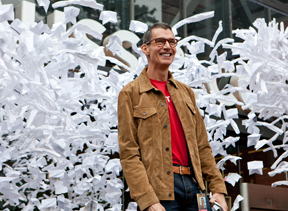Chip Bergh '79 at the company’s community day celebration with a backdrop of paper airplanes made from reused paper, emphasizing the company’s commitment to sustainability. On May 8, employees participated in nearly 170 projects in 46 countries around the world.   