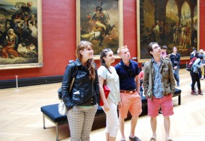 Briana Howard '14, l-r, Elisabeth Day '14, Will Rockafellow '14, and Mark Tajzler '14 in the grand gallery of French painting at the Louvre in Paris