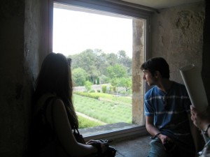 Elisabeth Day '14 and Mark Tajzler '14 look out the window of Van Gogh's room in the Saint-Paul de Mausole sanitarium in Saint-Remy, France.  Van Gogh painted "Starry Night" from this window.