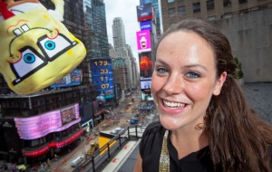 Alyson Shumeyko '14 overlooks Time Square with Sponge Bob Square Pants.