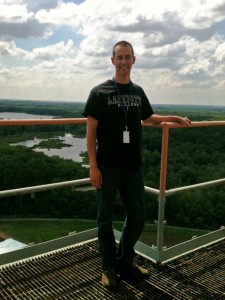 Kevin Galloway '14 atop the 22-story Saturn V test stand at NASA’s Marshal Space Flight Center. 
