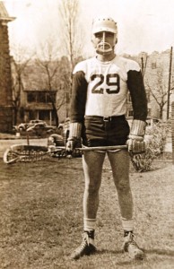 Harvey Cohen '40 wearing his lacrosse uniform and gear