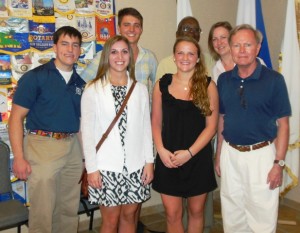 Max Dixon ’16, l-r, Courtney Landolfe ’14, Corey McKenna ’16, Arin Stasco ’14, Mary Wilford-Hunt, director of facilities planning, and David Veshosky, associate professor of civil and environmental engineering, presented their findings to members of the Roatan Rotary Club.