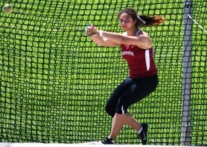 Rachel Pena '14 competes in the weight throw.