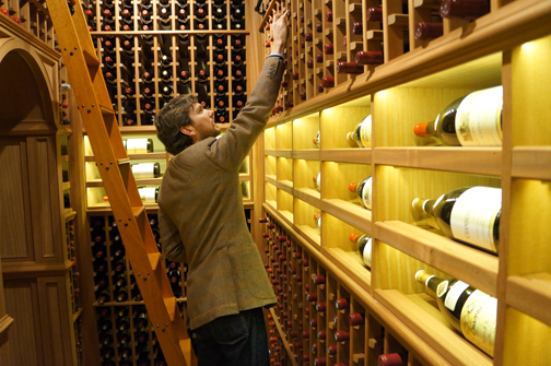 David Beckwith '01 studies a wine collection.