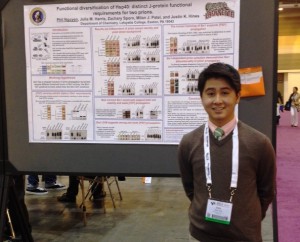 Phil Nguyen '14 with his winning poster at the conference