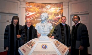 Jamaican Prime Minister Portia Simpson Miller, l-r, Harry Ettlinger, Kevin Mandia ’92, and Roger Ross Williams, stand by the bust of the Marquis de Lafayette in Markle Hall.