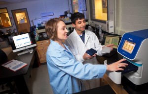Professor Lauren Anderson and Tyler Fruneaux ’14 work in the lab in Acopian Engineering Center.