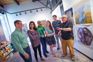 James Ferri, left, James T. Marcus Professor and head of chemical and biomolecular engineering, and Ed Kerns, right, Eugene H. Clapp II ’36 Professor of Art, discuss the project with students. 