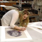 Genna Asselin ’15 puts the finishing touches on “The Ecstasy of Saint Theresa.”