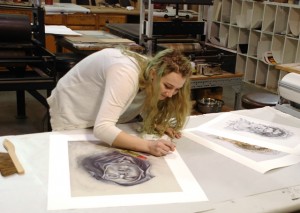Genna Asselin ’15 puts the finishing touches on “The Ecstasy of Saint Theresa.”