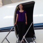 Bridget Rauch ’15 with a corporate aircraft powered with a Rolls-Royce engine