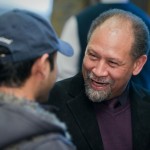 Professor Holton speaks with students during the opening of his exhibit at the Williams Center Gallery last year.