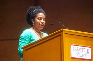 Jasmine Jay '14 reads her poem “Two-Dimensional Jesus” during the H. MacKnight Black Poetry Reading.