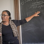 Wendy Wilson-Fall teaching at the blackboard
