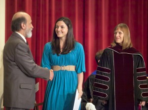 Heather Hughes ’15 accepts the Louise M. Olmsted Prize in Ethics from Professor George Panichas. 