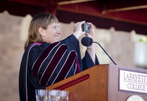 President Alison Byerly takes a photo of the crowd for Twitter. 
