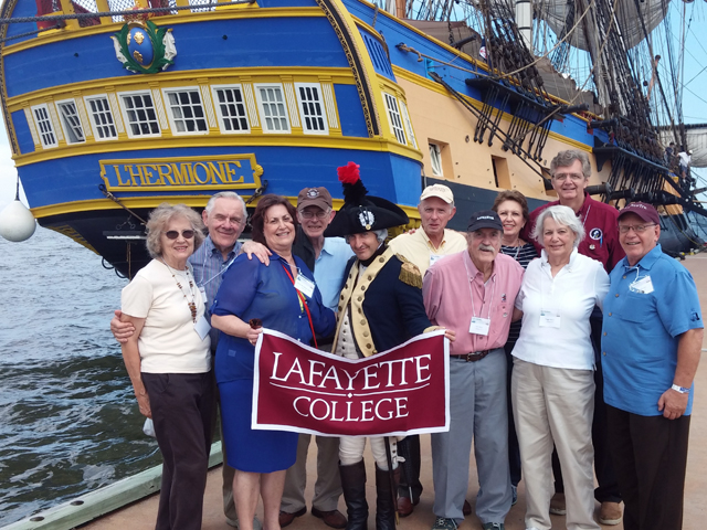 College Archivist Diane Shaw and several alumni join the Marquis in welcoming the Hermione to Yorktown. 