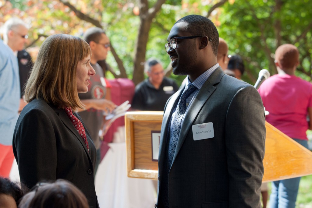 President Alison Byerly speaks with Robert Young during the opening reception for “Tales of Our Brothers: The Journey of David and Washington McDonogh.” Young curated the long-term exhibit featured in Pardee Hall.