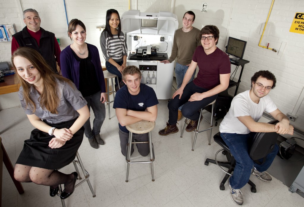 Colin Rementer ’12, second from right, worked with the College's 3D printer in the chemical and biomolecular engineering senior design course. 