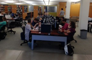 Students fill the study tables at Skillman Library. 